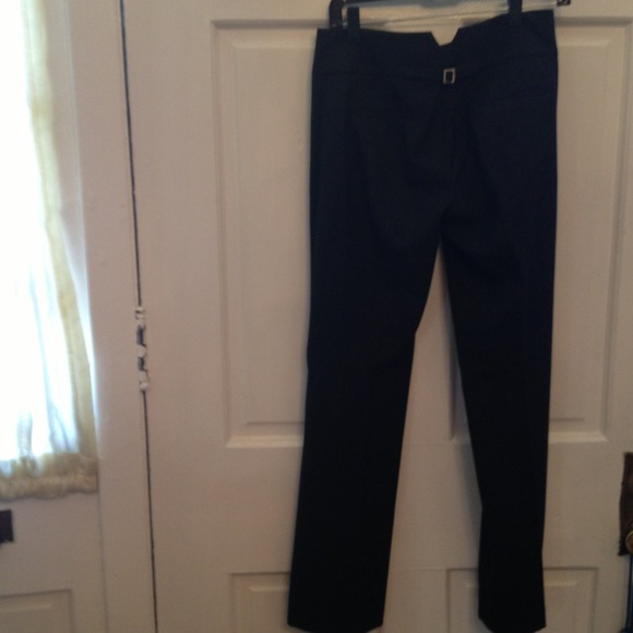 Charcoal gray pinstripe suit with jeweled button