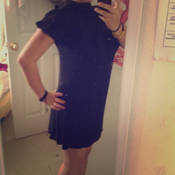 A black turtle Neck dress
