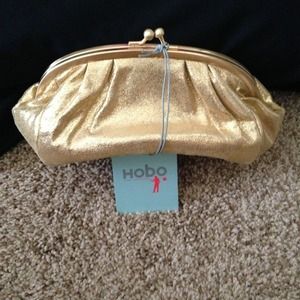 Price ⬇Hobo gold small clutch