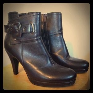 Dark brown/black bootie with buckle and studs