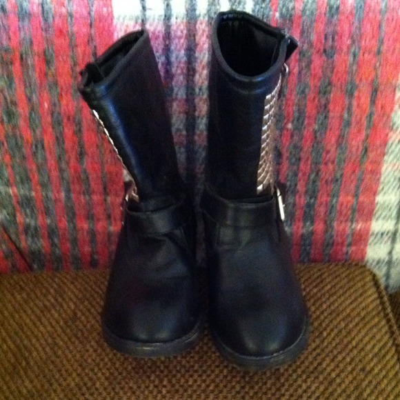 Calf height biker boots.