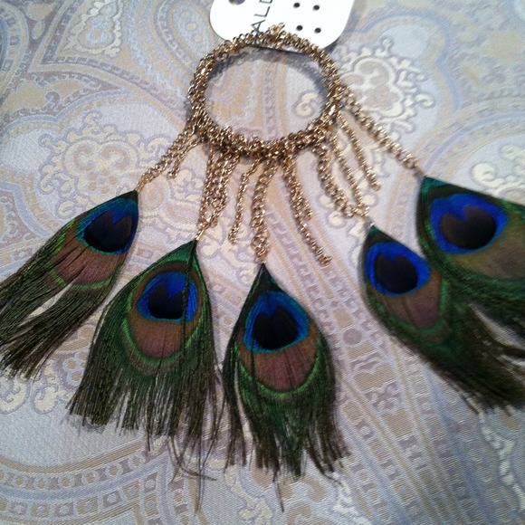 Irregular peacock feather earrings