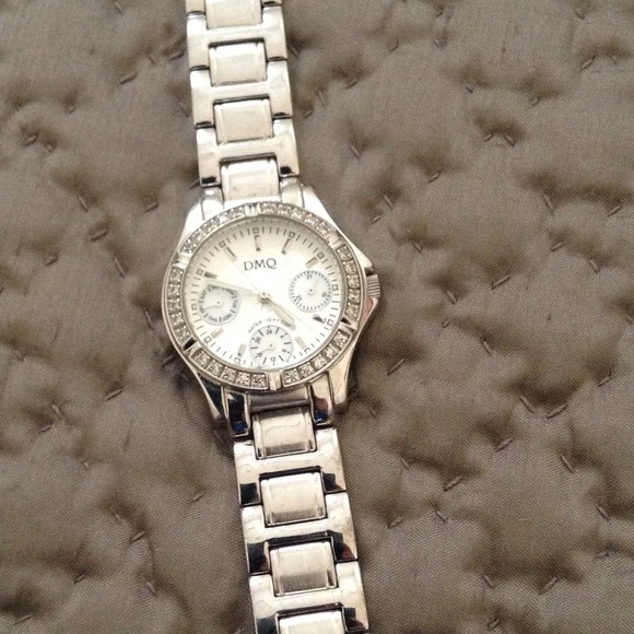 DMQ silver watch with simulated diamond bezel
