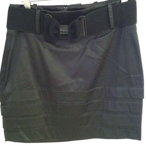 Black satin skirt with a belt. Brand new