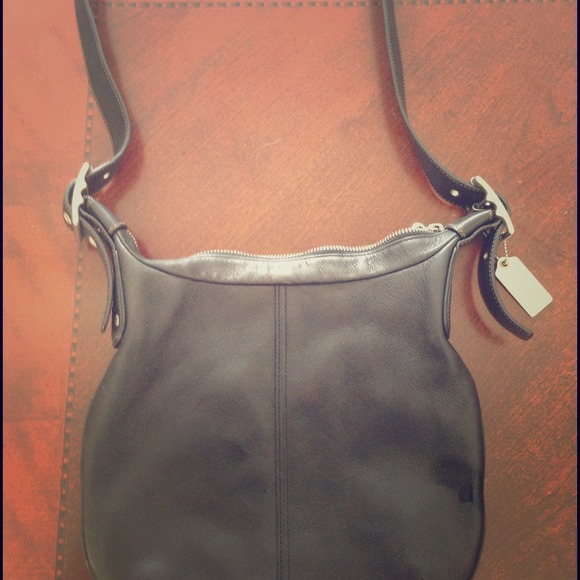 Authentic Coach cross body bag. No signs of wear.