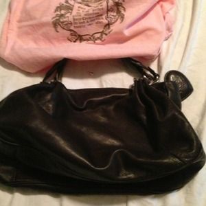 Black Authentic Leather Juicy Couture handbag.