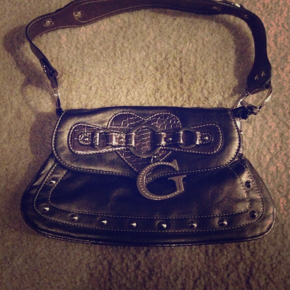 A small authentic Guess purse
