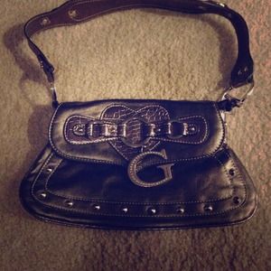 A small authentic Guess purse