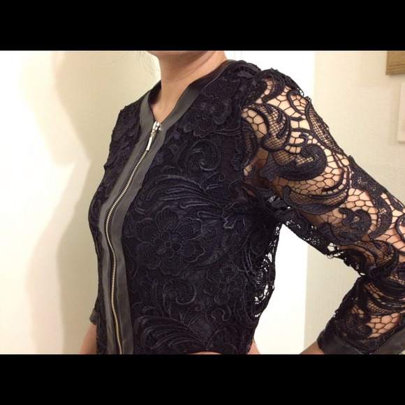 Black laced jacket with leather trim