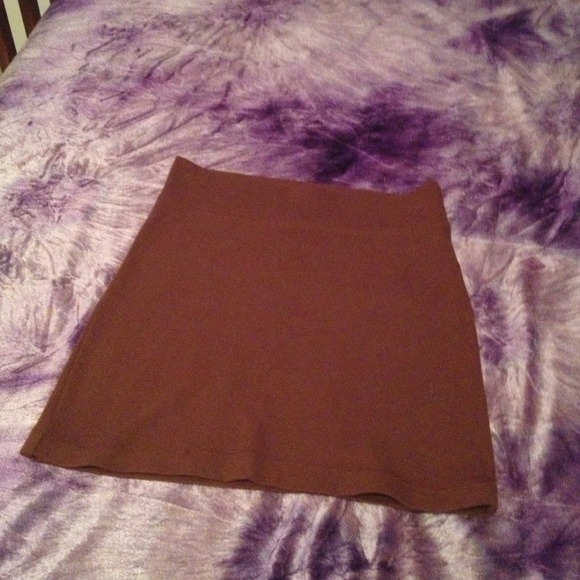 Right for brown skirt
