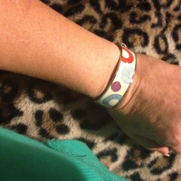 SOLD. CPAch bracelet with a matching Coach ring.