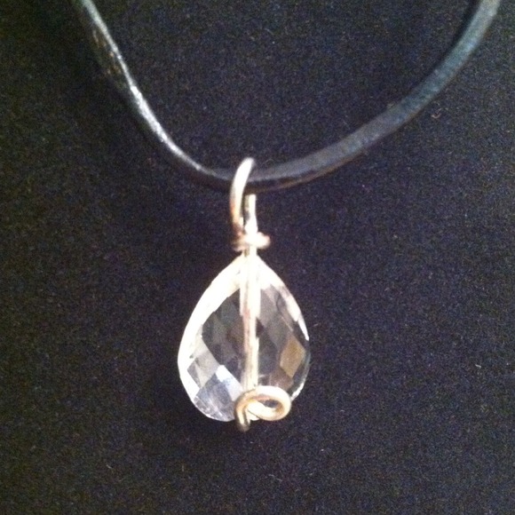 Small silver wire and crystal bead pendant.
