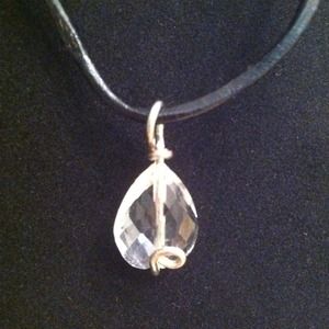 Small silver wire and crystal bead pendant.