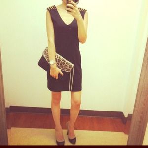 Women black dress with studs on the shoulder