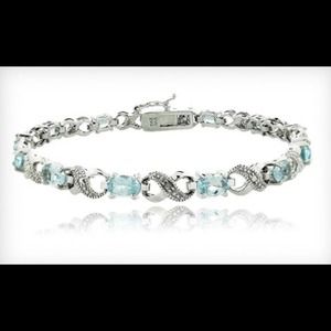 Blue topaz and diamond infinity bracelet