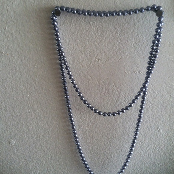 Faux 60 inch bead necklace in a pretty silver
