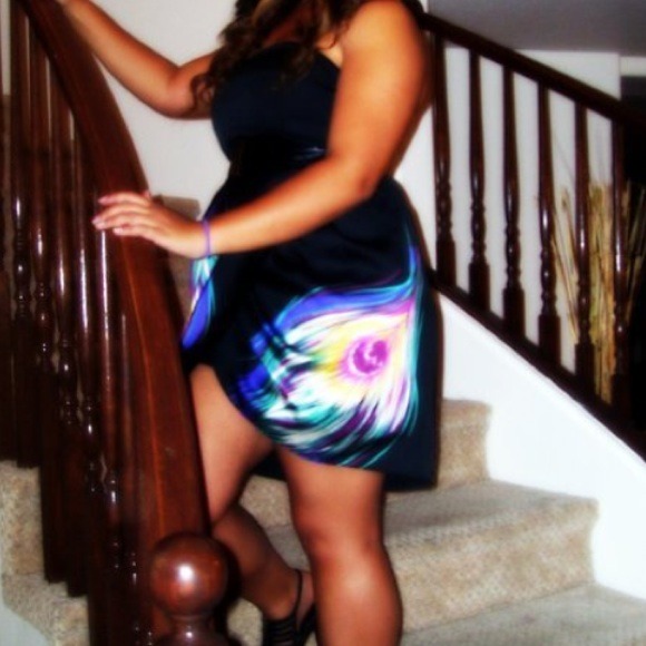 Peacock strapless dress.