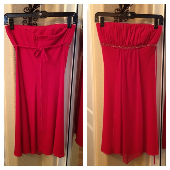 Red strapless dress with tie in the back.