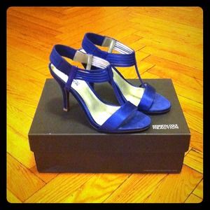 On hold for robin396 Kenneth Cole Reaction royal