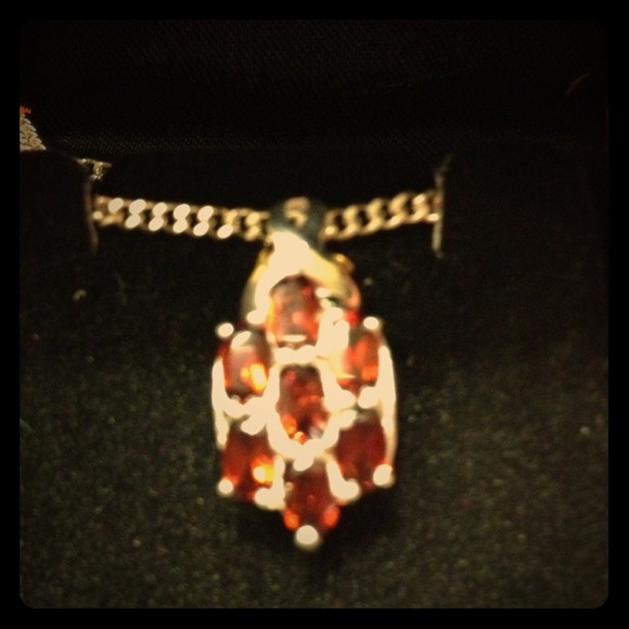 Silver necklace with ruby in the original box