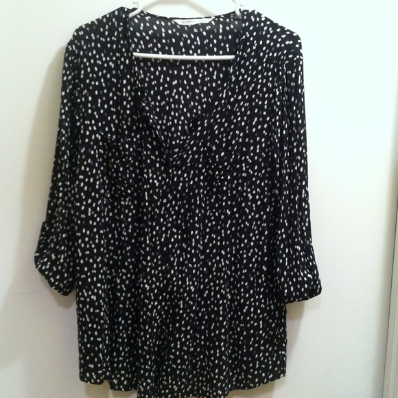 Black button up top with gray and white spots
