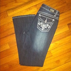 NWOT dark wash boot cut jeans.