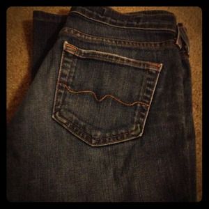 Red engine flare jeans