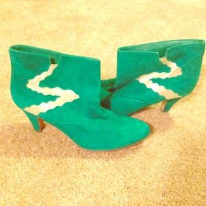 Unique green booties with gold accents