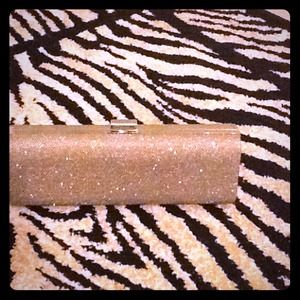 Shimmering beige clutch