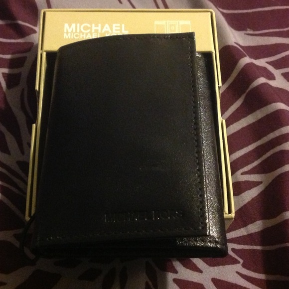 Black leather Michael Kors men's wallet