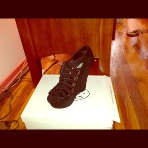 Black suede platform wedges.