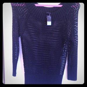 Never worn. Black crochet 3-quarter length shirt.