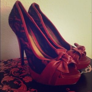 Red faux leather and black lace heels