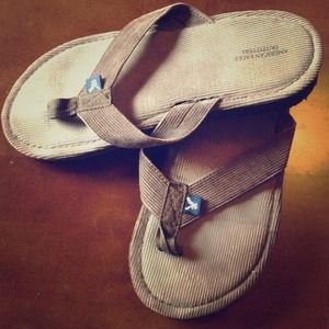 Brown American eagle flip flops