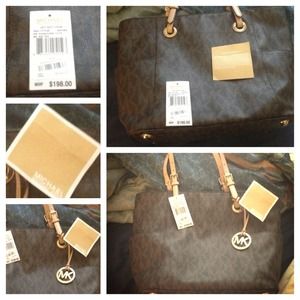 Michael kors bag bought for 215.00 used twice !