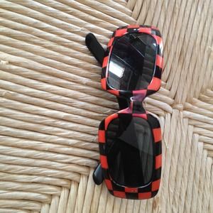 Funky orange and black sunglasses. Vintage
