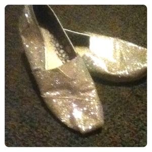 Silver-sparkle Toms.