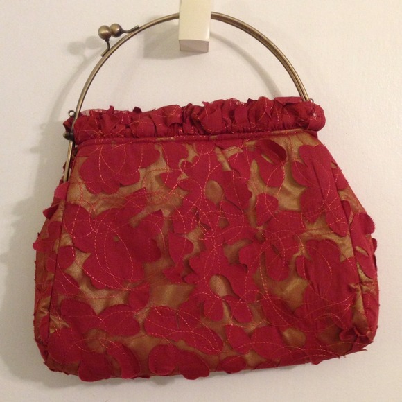 Red purse with metal frame