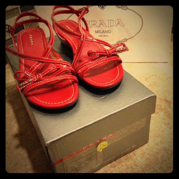 Authentic Prada red patent wedges