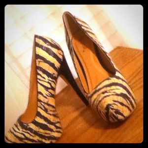 Platform stilettos zebra print