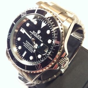 Men's Silver with Black Oyster Sub-Mariner.