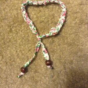 Adjustable tie bracelet