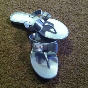 Coach silver sandals. Worn once!!  Great shape!!