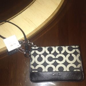 Authentic Coach wristlet. NWT. No trades.