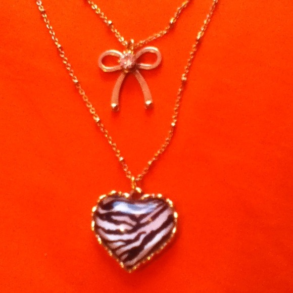 TRADED Betsey Johnson zebra heart/crystal bow neck