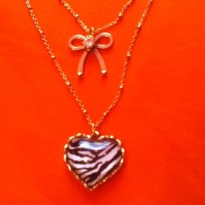 TRADED Betsey Johnson zebra heart/crystal bow neck