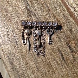 Silver tone embellished broach