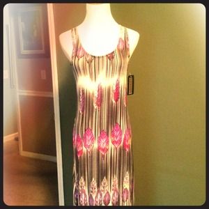 Gorgeous feather long dress. 💘