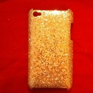 A gold sparkely iPod touch 4g case.