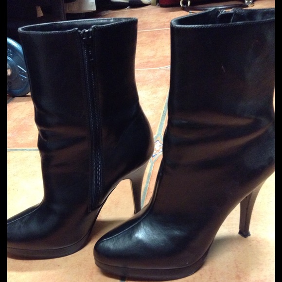 High heel above ankle boots.
